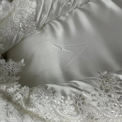 reducteur-de-lit-pour-bebe-blanc