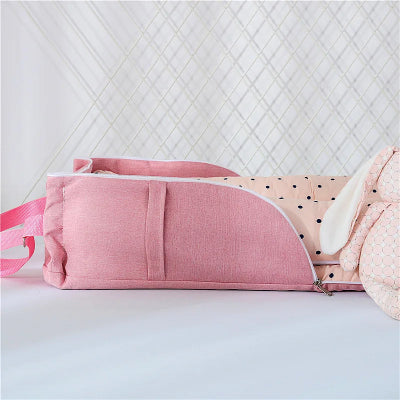 reducteur-de-lit-rose-leger-portable