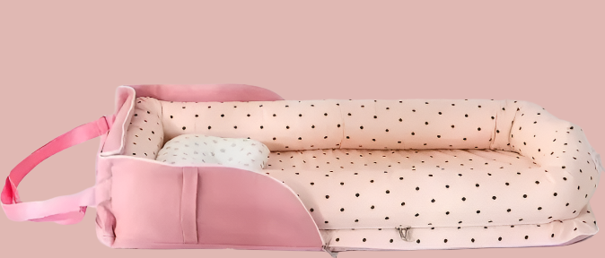 reducteur-de-lit-pliable-rose